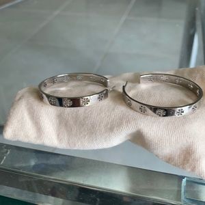 Tory Burch silver shop earrings.